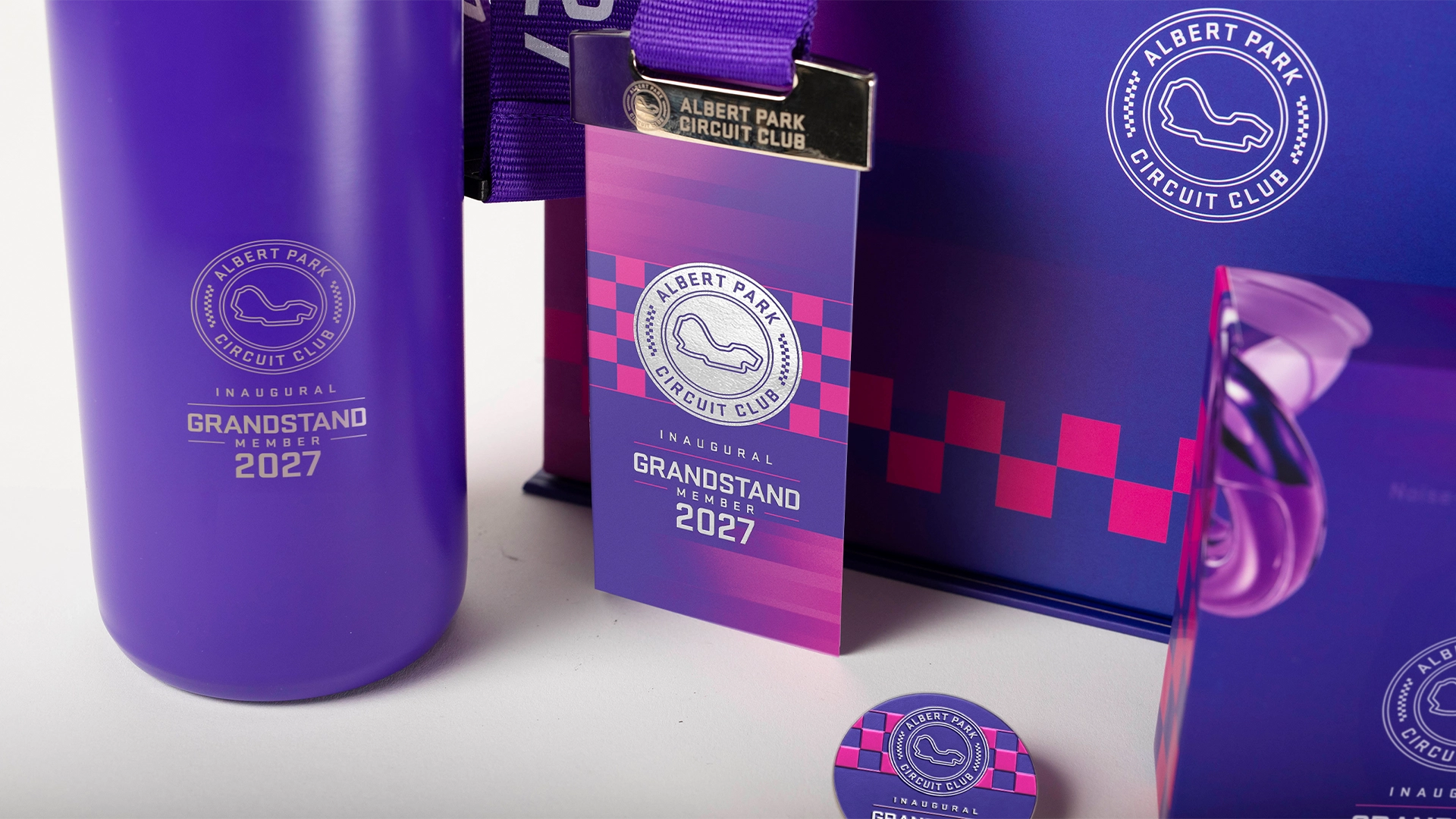Inaugural Grandstand Member 2027 commemorative tumbler, member pass lanyard and pin badge